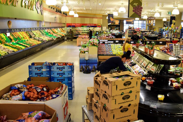 A photo of a commissary employee working