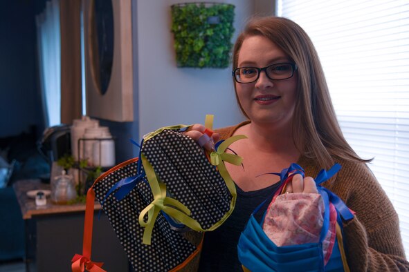 Jean Lawrence, 436th Logistics Readiness Squadron secretary, sews cloth masks for donation to local hospitals, emergency service providers and members of the Team Dover community, April 10, 2020, at Dover Air Force Base, Delaware. Lawrence has sewn 77 masks so far and continues to make more in an effort to take care of Airmen and their families during the COVID-19 pandemic.(U.S. Air Force photo by Airman 1st Class Faith Schaefer)