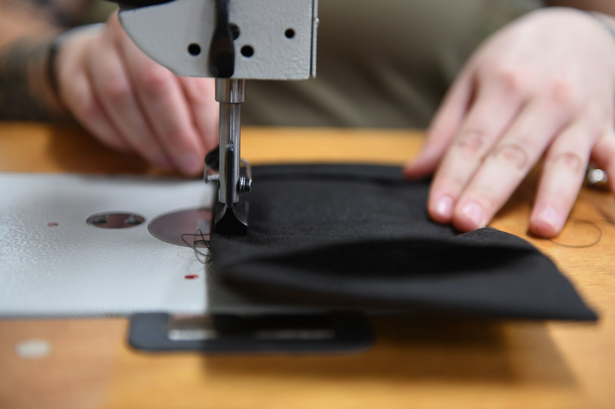 A person sews