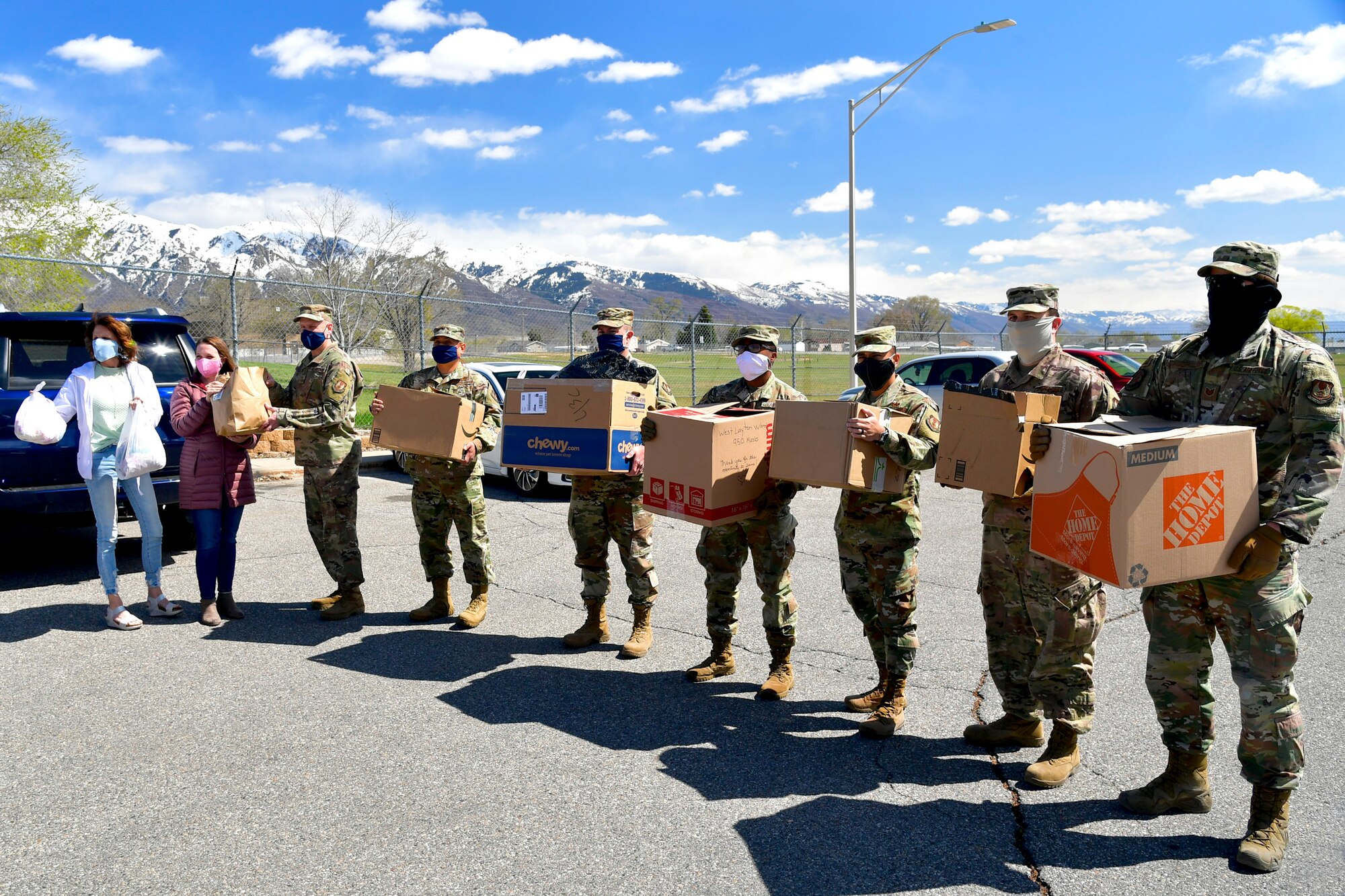 Local community volunteers deliver homemade face masks for the base military and civilian Airman personnel.
