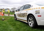 Soldiers of the 63rd Theater Aviation Brigade, Kentucky National Guard, help direct traffic detail at Kentucky's first COVID-19 testing site at Lakeview Park in Frankfort Apr. 1, 2020.