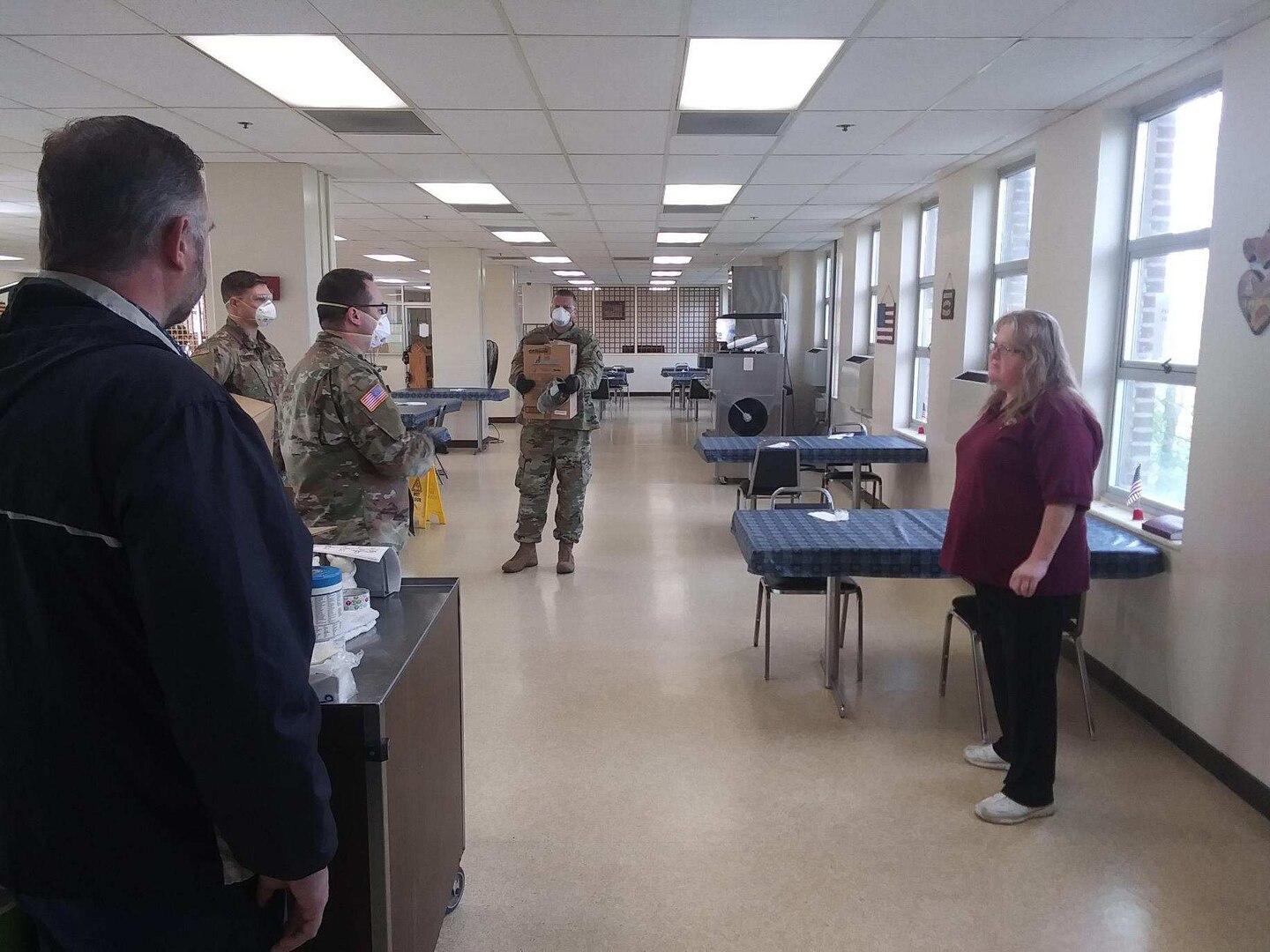 Members of the West Virginia National Guard (WVNG) provide training on proper personal protective equipment (PPE), sanitizing and decontamination methods and best practices for the prevention of COVID-19 spread to staff at the Barboursville Veterans home April 14, 2020. Members of Task Force Chemical, Biological, Radiological and Nuclear (CBRN) Response Enterprise (TF-CRE) will make additional visits to the facility in the coming days to train all support staff and facilitate implementing plans and procedures for how to deal with COVID-19 positive cases, if any were to arrive. (Courtesy photo)