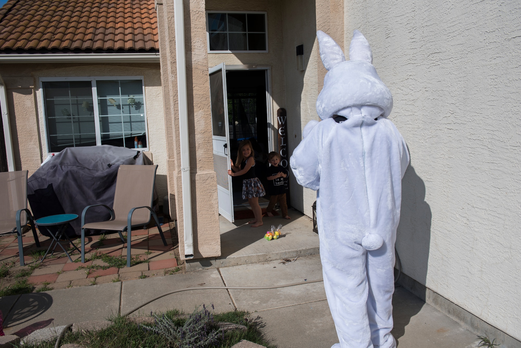 The Easter Bunny prepares to give candy to children of military families with deployed parents April 11, 2020, at Travis Air Force Base, California. The Easter Bunny hand delivered 163 bags of candy to the children’s homes. (U.S. Air Force photo by Airman 1st Class Cameron Otte)