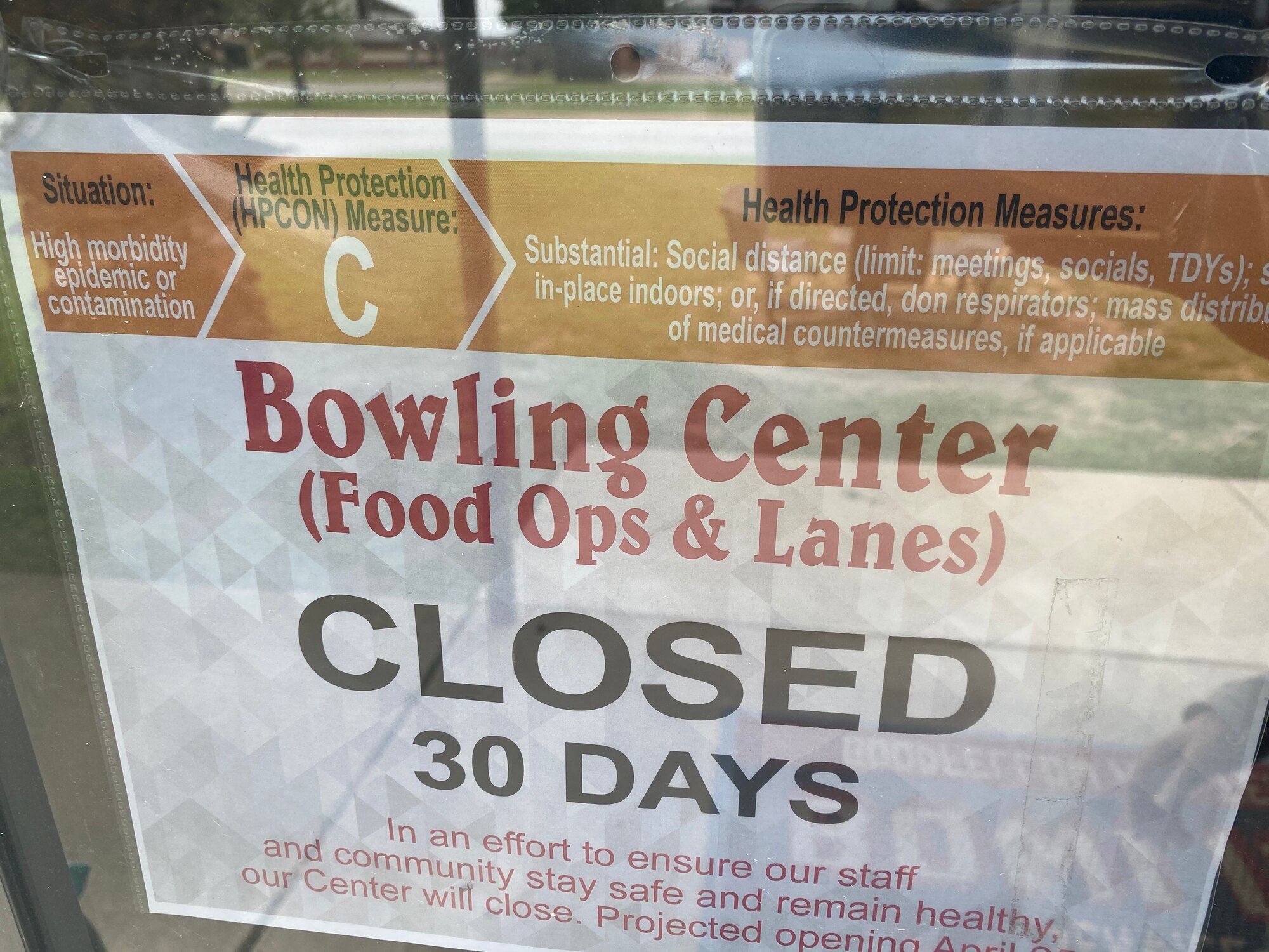 The bowling center on Goodfellow Air Force Base, Texas, display a sign informing base members that due to COVID-19 they are closed for 30 days on April 14, 2020. Some organizations are closed as a safety precaution to the virus, others have started operating with minimum manning. (U.S. Air Force photo by Senior Airman Seraiah Wolf)