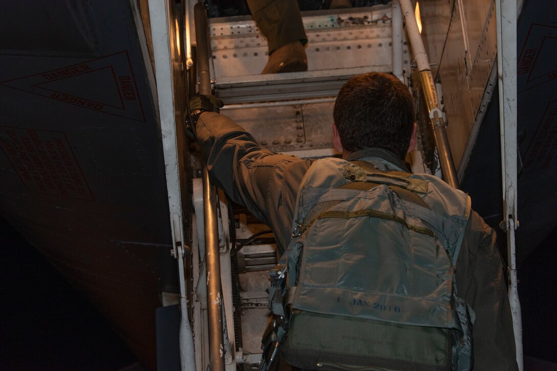 Capt. Corey Tucker, 9th Bomb Squadron pilot, climbs into a B-1B Lancer cockpit at Dyess Air Force Base, Texas, April 10, 2020.