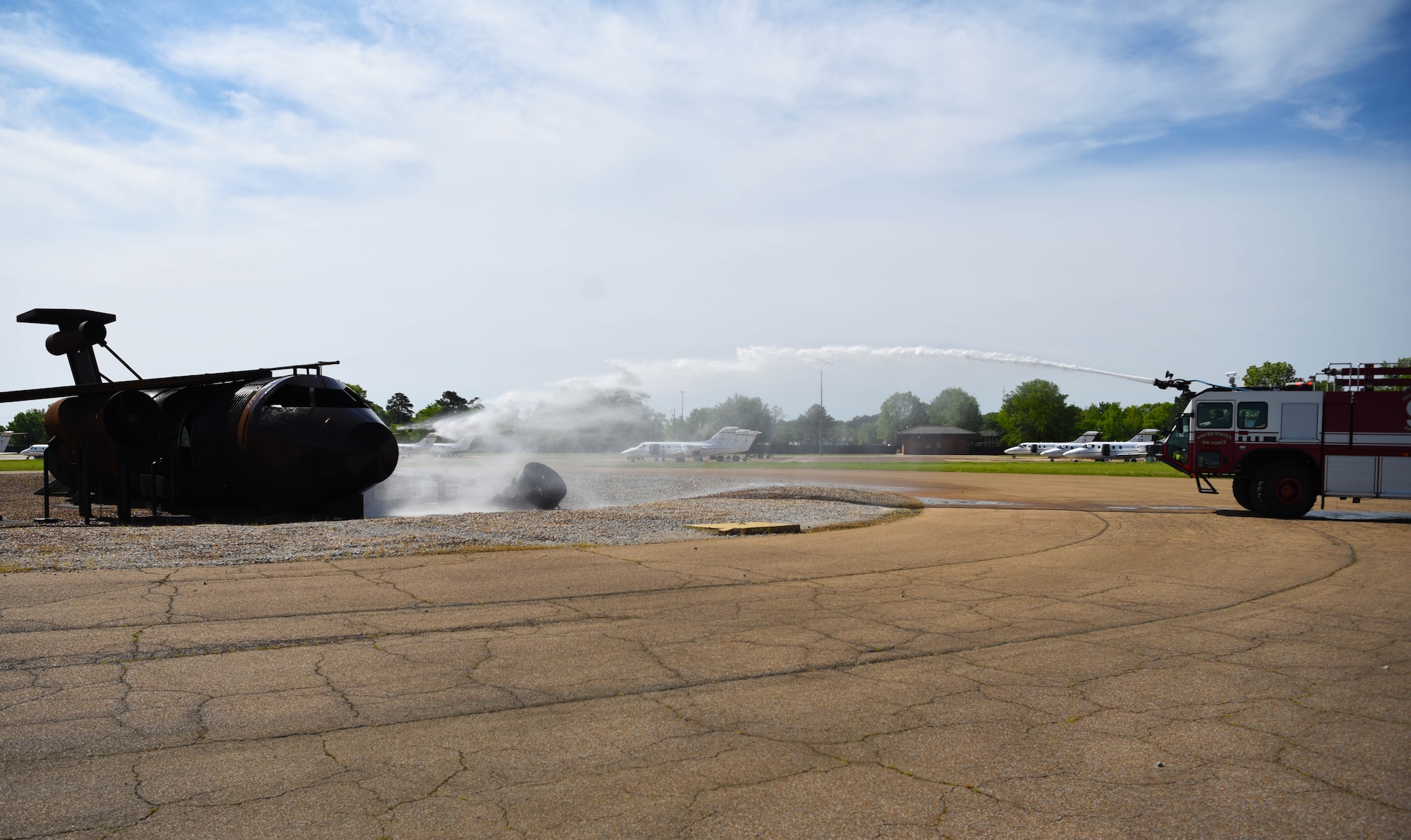 A Striker 1500 shoots out water during a training exercise April 10, 2020, on Columbus Air Force Base, Miss. Training is a key departmental function that ensures the ability to provide effective emergency response for Columbus AFB Fire and Emergency Services. (U.S. Air Force photo by Airman 1st Class Jake Jacobsen)