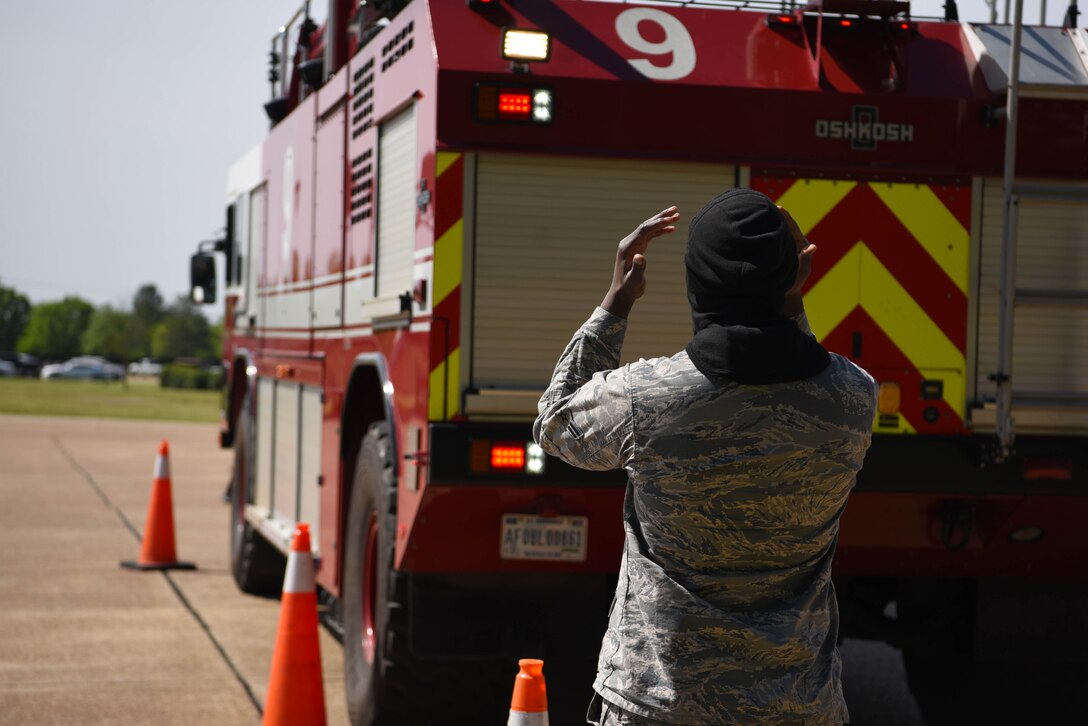 Airman 1st Class SirDarren Duncan, 14th Civil Engineer Squadron firefighter, navigates a Striker 1500 into a set of cones for training April 10, 2020, on Columbus Air Force Base, Miss. Successful completion of the training shows that the Airmen are capable of safely mitigating the hazards associated with driving a fire vehicle during an emergency response. (U.S. Air Force photo by Airman 1st Class Jake Jacobsen)