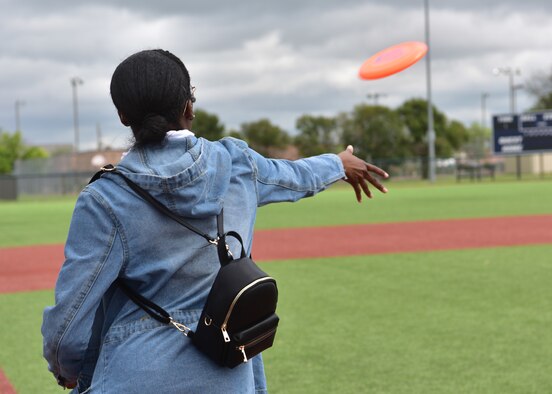 A competitor in the enlisted student category competes in the disc toss event during the 315th Training Squadron ‘Break the Pandemic’ competition on Goodfellow Air Force Base, Texas, April 11, 2020. The 315th TRS hosted the competition to give members of Team Goodfellow a way to interact while observing social distancing regulations in response to the COVID-19 pandemic. (U.S. Air Force photo by Staff Sgt. Chad Warren)