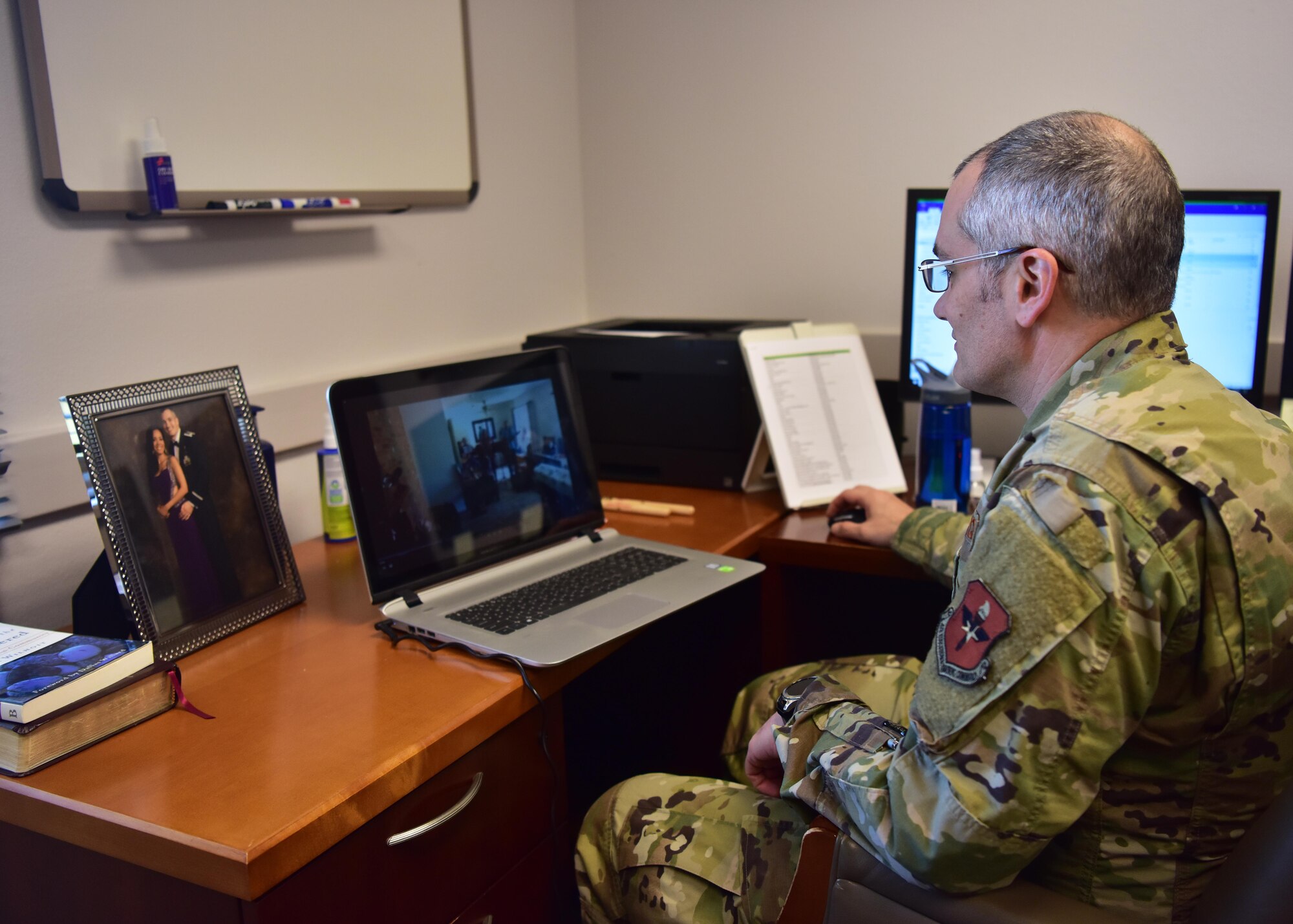 U.S. Air Force Capt. Jeremiah Blackburn, 17th Training Wing chaplain, reviews the live-stream footage from Sunday’s Easter service at the Taylor Chapel on Goodfellow Air Force Base, Texas, April 14, 2020. The chapel has moved all services and activities to a virtual platform in response to the COVID-19 pandemic. (U.S. Air Force photo by Staff Sgt. Chad Warren)