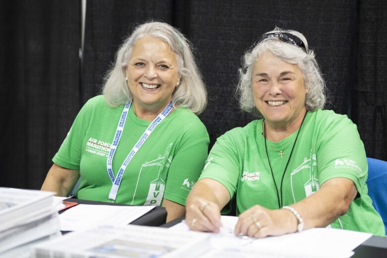 The Air Force Marathon is looking for 2,600 volunteers to be part of another successful race weekend at the 2020 Air Force Marathon. Volunteer registration opens May 1. There is a wide variety of opportunities for volunteers to help at the Health and Fitness Expo on Sept. 17-18, and on race day, Sept. 19. Some of those volunteer opportunities are helping with runner shirt and packet pickup, pre-race set up, and distributing water to runners on race day. (U.S. Air Force photo/Wesley Farnsworth)