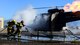 A photo of Airmen fighting fire