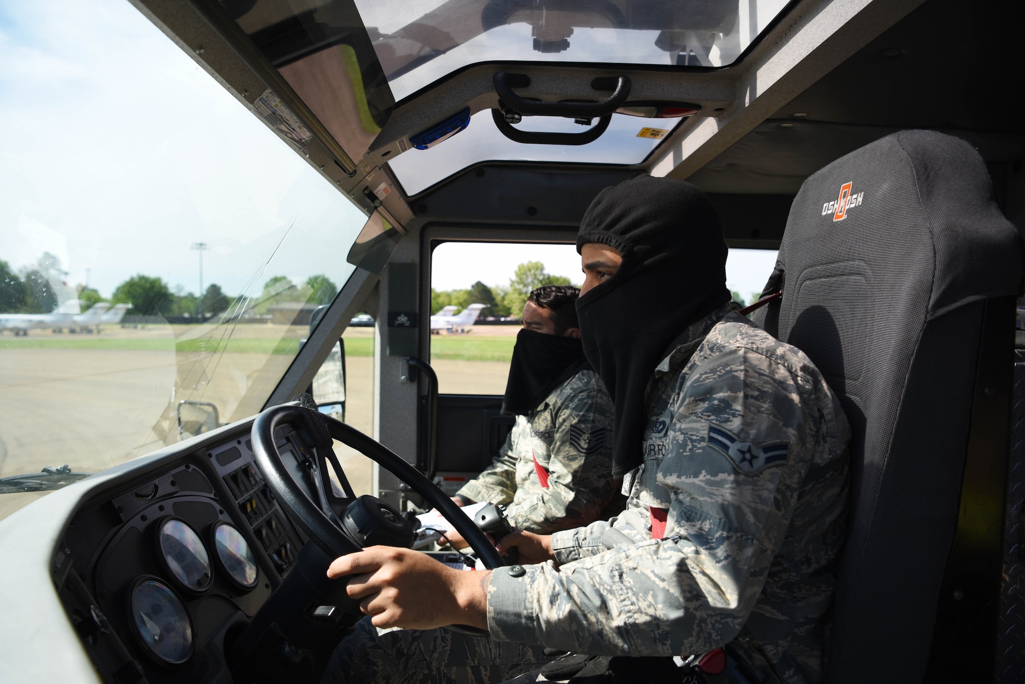 Airman 1st Class Khalil Jeter (foreground), 14th Civil Engineer Squadron firefighter, and Tech Sgt. Michael Mucha, 14th Civil Engineer Squadron station captain, operate a Striker 1500 April 10, 2020, on Columbus Air Force Base, Miss. The 14th CES firefighters respond to aircraft and facility emergencies within minutes and have the ability to control, contain and stop numerous types of emergencies from escalation. (U.S. Air Force photo by Airman 1st Class Jake Jacobsen)