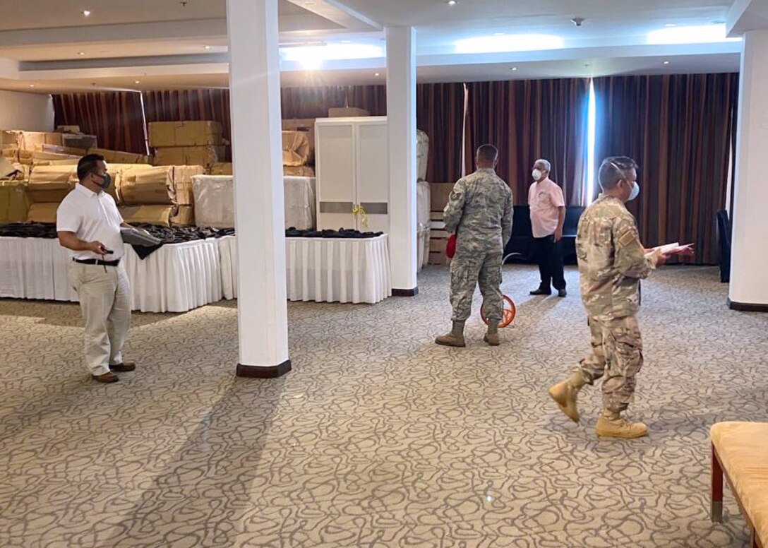 Engineering assessment teams from Naval Facilities Engineering Command (NAVFAC) Marianas and the Guam Air National Guard conduct a walkthrough of a hotel located in Tumon April 13 as part of the Hotel to Healthcare conversion program in support of the U.S. Army Corps of Engineers, and in coordination with the government of Guam.