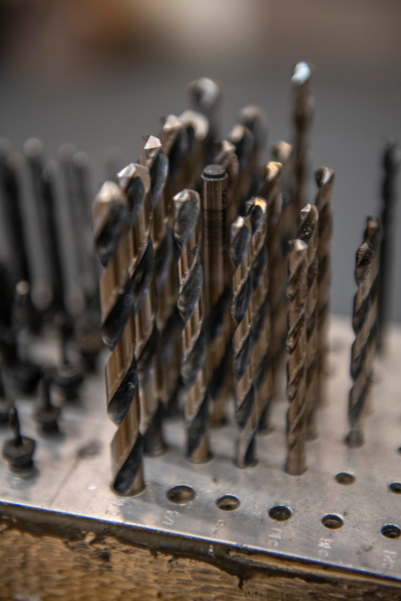 Drill bits are organized and placed by size at the 100th Maintenance Squadron aircraft structural maintenance shop on RAF Mildenhall, England, April 8, 2020. The aircraft structural maintenance shop, sometimes simply called sheet metal, also includes the corrosion control section and performs multiple tasks which enable RAF Mildenhall aircraft to continue to execute the mission. (U.S. Air Force photo by Staff Sgt. Luke Milano)