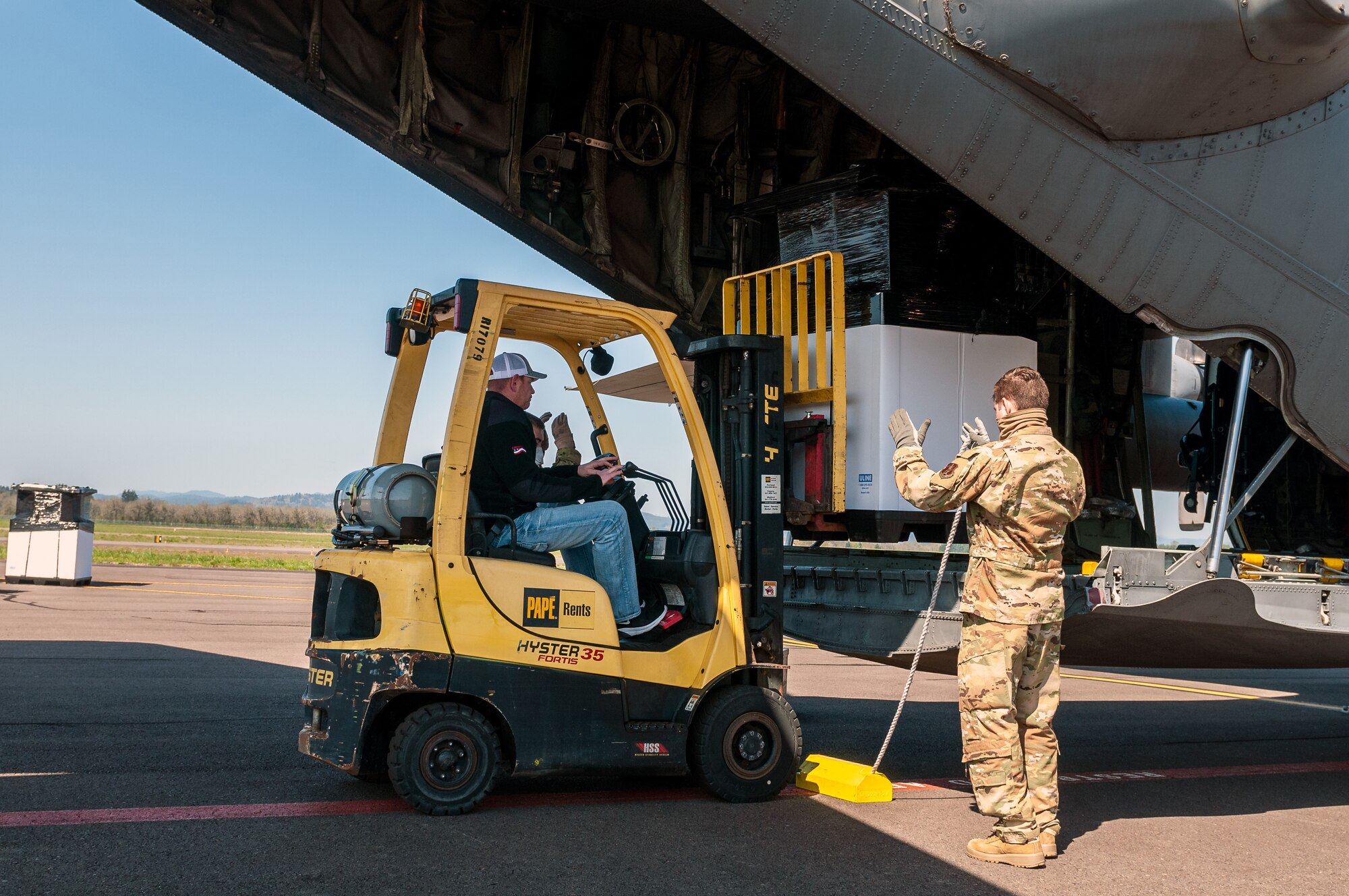 Cargo being loaded onto aircraft.