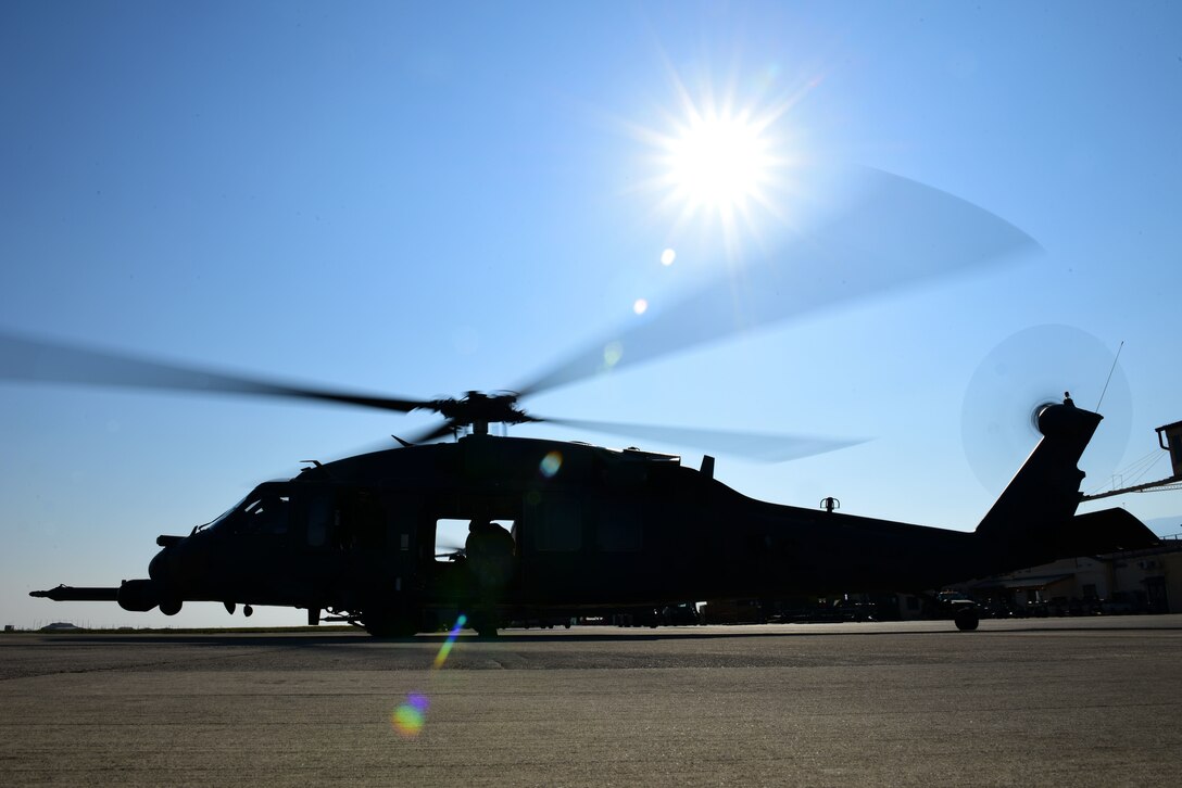 U.S. Airmen assigned to the 56th and 57th Rescue Squadrons prepare for takeoff in an HH-60G Pave Hawk at Aviano Air Base, Italy, April 2, 2020. Airmen of the 56th and 57th RQS train frequently to keep their skills sharp and their technical knowledge up-to-date. (U.S. Air Force photo by Staff Sgt. Kelsey Tucker)