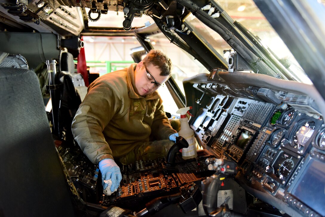U.S. Air Force Airman 1st Class Canyon Abrigo, 31st Aircraft Maintenance Squadron, 56th Helicopter Maintenance Unit crew chief, sanitizes the inside of an HH-60G Pave Hawk at Aviano Air Base, Italy, April 2, 2020. The sanitization of frequently touched surfaces is important to slow the spread of viruses like COVID-19. (U.S. Air Force photo by Staff Sgt. Kelsey Tucker)
