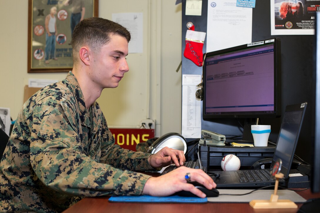 A U.S. Marine works on administrative paperwork at Marine Corps Air Station Cherry Point, North Carolina, January 14.
