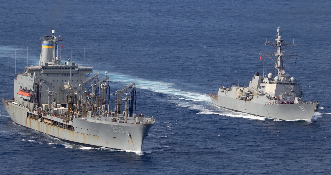 USNS Laramie steams beside USS Pinckney  before a replenishment-at-sea.