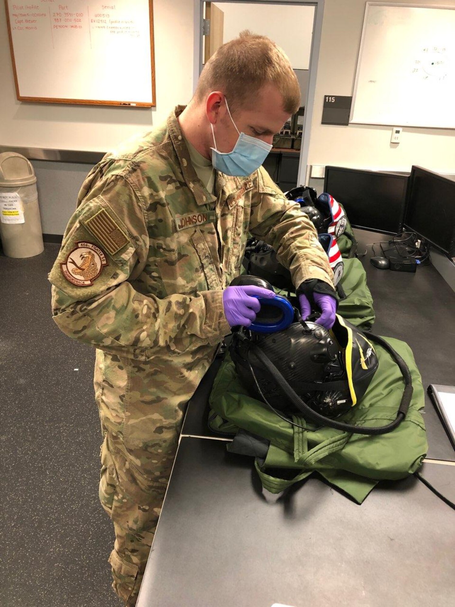 Tech. Sgt. Corey Johnson from the Aircrew Flight Equipment shop in the 419th Operations Support Squadron conducts an inspection on a Helmet Mounted Display.