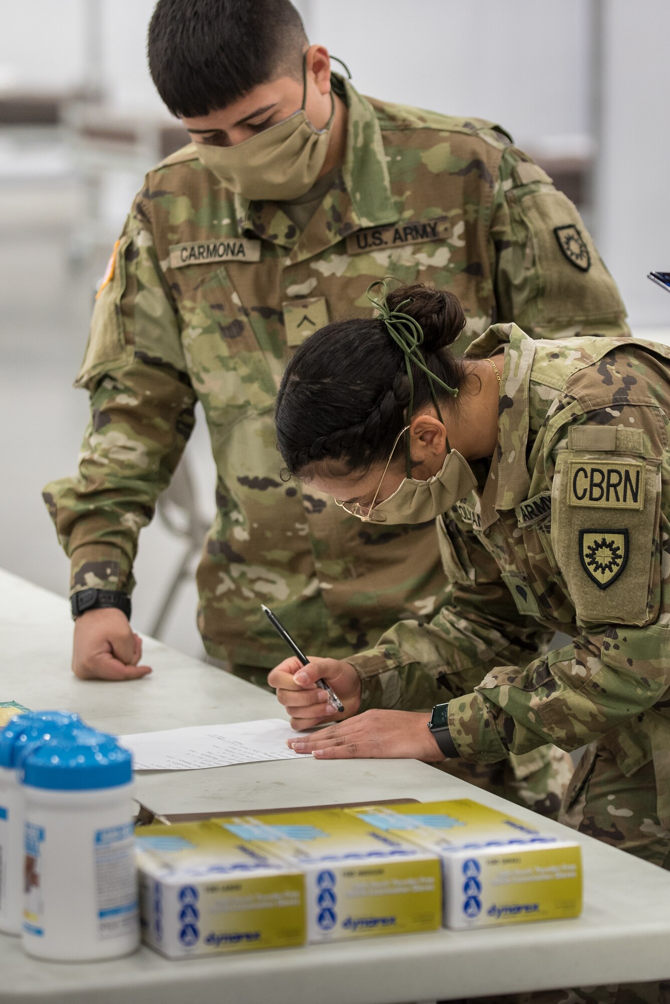 Soldiers from the Kentucky Army National Guard’s 103rd Chemical Battalion inventory medical supplies for an Alternate Care Facility at the Kentucky Fair and Exposition Center in Louisville, Ky., April 14, 2020. The site, which is expected to be operational April 15, will treat patients suffering from COVID-19 if area hospitals exceed available capacity. The location initially will offer care for up to 288 patients and is scalable to 2,000 beds. (U.S. Air National Guard photo by Dale Greer)