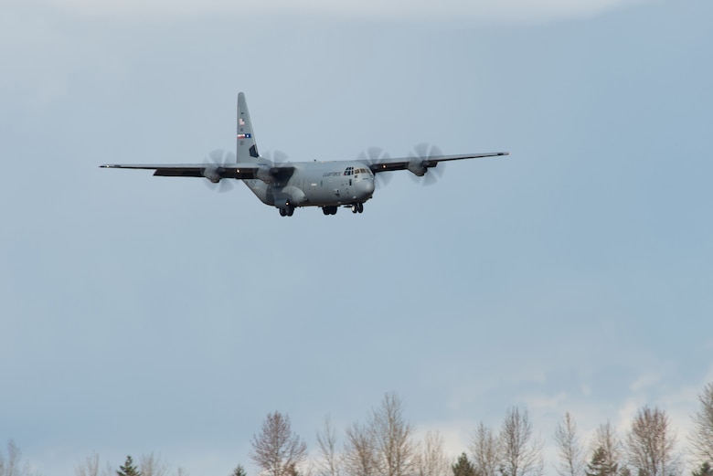 A U.S. Air Force C-130J Super Hercules approaches the runway at Joint Base Lewis-McChord, Wash., March 25, 2020. The C-130 carried U.S. Army Soldiers assigned to the 627th Hospital Center, Fort Carson, Colo., and equipment to set up a field hospital in Seattle, Wash. to help decompress bed space at local hospitals to enable them to treat patients infected with COVID-19. (U.S. Air Force photo by Senior Airman Tryphena Mayhugh)