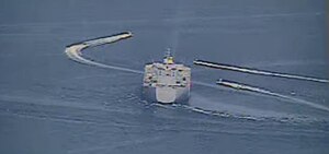 NORTH ARABIAN GULF (April 15, 2020) Iranian Islamic Revolutionary Guard Corps Navy (IRGCN) vessels conducted unsafe and unprofessional actions against U.S. Military ships by crossing the ships’ bows and sterns at close range while operating in international waters of the North Arabian Gulf. The expeditionary mobile sea base USS Lewis B. Puller (ESB 3) is conducting joint interoperability operations in support of maritime security in the U.S. 5th Fleet area of operations. (U.S. Navy photo)