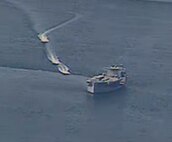 NORTH ARABIAN GULF (April 15, 2020) Iranian Islamic Revolutionary Guard Corps Navy (IRGCN) vessels conducted unsafe and unprofessional actions against U.S. Military ships by crossing the ships’ bows and sterns at close range while operating in international waters of the North Arabian Gulf. The expeditionary mobile sea base USS Lewis B. Puller (ESB 3) is conducting joint interoperability operations in support of maritime security in the U.S. 5th Fleet area of operations. (U.S. Navy photo)