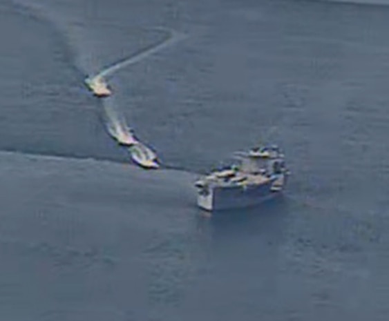 NORTH ARABIAN GULF (April 15, 2020) Iranian Islamic Revolutionary Guard Corps Navy (IRGCN) vessels conducted unsafe and unprofessional actions against U.S. Military ships by crossing the ships’ bows and sterns at close range while operating in international waters of the North Arabian Gulf. The expeditionary mobile sea base USS Lewis B. Puller (ESB 3) is conducting joint interoperability operations in support of maritime security in the U.S. 5th Fleet area of operations. (U.S. Navy photo)