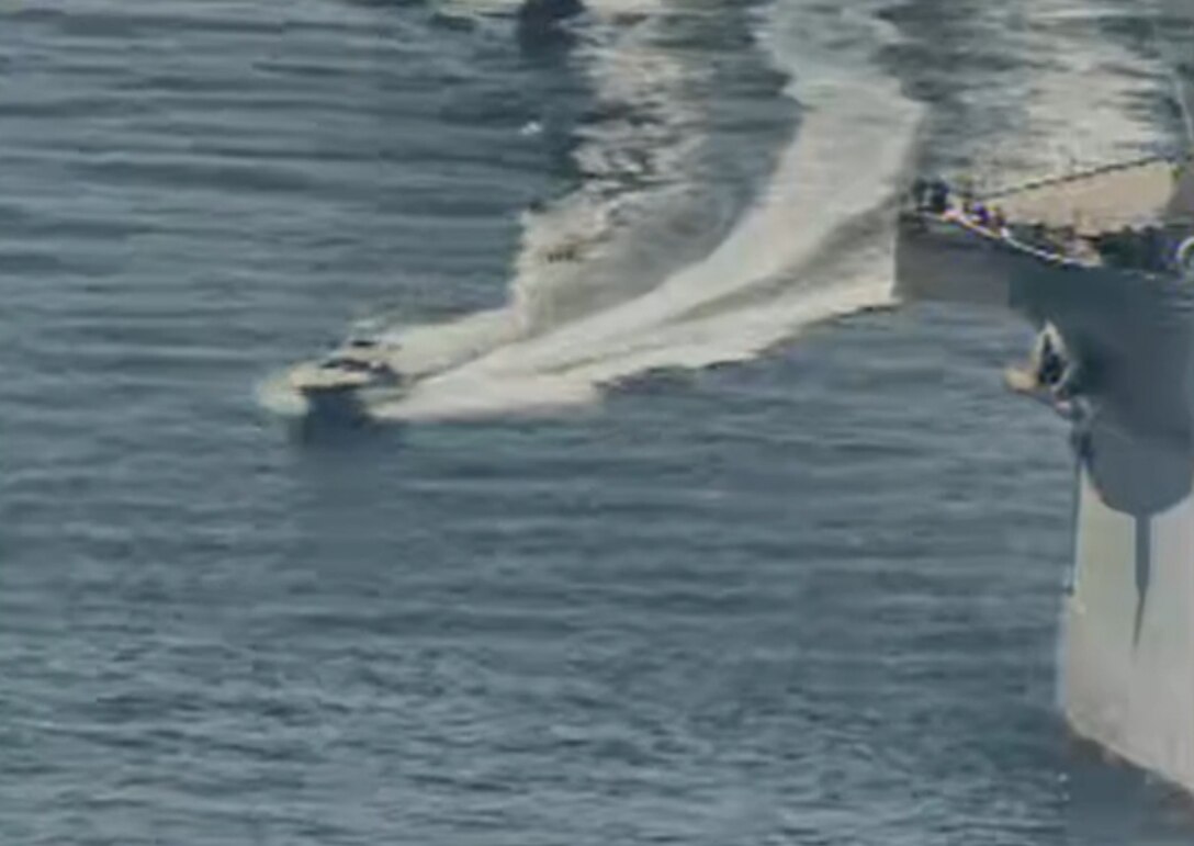 NORTH ARABIAN GULF (April 15, 2020) Iranian Islamic Revolutionary Guard Corps Navy (IRGCN) vessels conducted unsafe and unprofessional actions against U.S. Military ships by crossing the ships’ bows and sterns at close range while operating in international waters of the North Arabian Gulf. The expeditionary mobile sea base USS Lewis B. Puller (ESB 3) is conducting joint interoperability operations in support of maritime security in the U.S. 5th Fleet area of operations. (U.S. Navy photo)