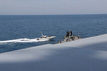 NORTH ARABIAN GULF (April 15, 2020) Iranian Islamic Revolutionary Guard Corps Navy (IRGCN) vessels conducted unsafe and unprofessional actions against U.S. Military ships by crossing the ships’ bows and sterns at close range while operating in international waters of the North Arabian Gulf. The guided-missile destroyer USS Paul Hamilton (DDG 60) is conducting joint interoperability operations in support of maritime security in the U.S. 5th Fleet area of operations. (U.S. Navy photo)
