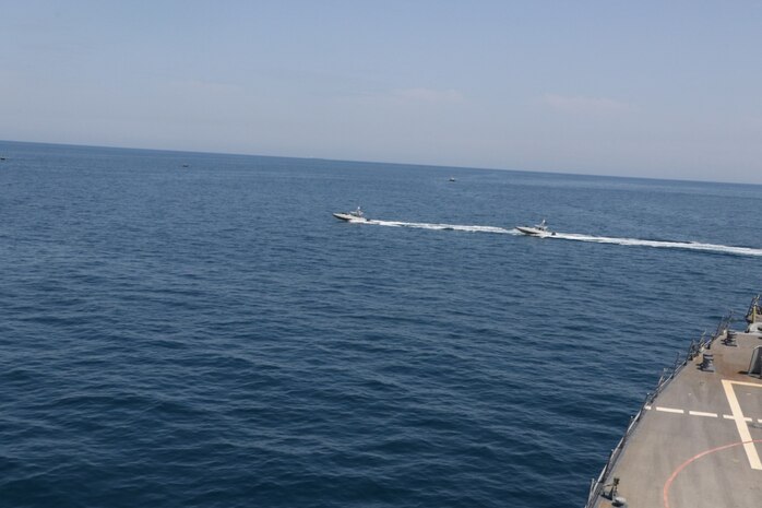 NORTH ARABIAN GULF (April 15, 2020) Iranian Islamic Revolutionary Guard Corps Navy (IRGCN) vessels conducted unsafe and unprofessional actions against U.S. Military ships by crossing the ships’ bows and sterns at close range while operating in international waters of the North Arabian Gulf. The guided-missile destroyer USS Paul Hamilton (DDG 60) is conducting joint interoperability operations in support of maritime security in the U.S. 5th Fleet area of operations. (U.S. Navy photo)