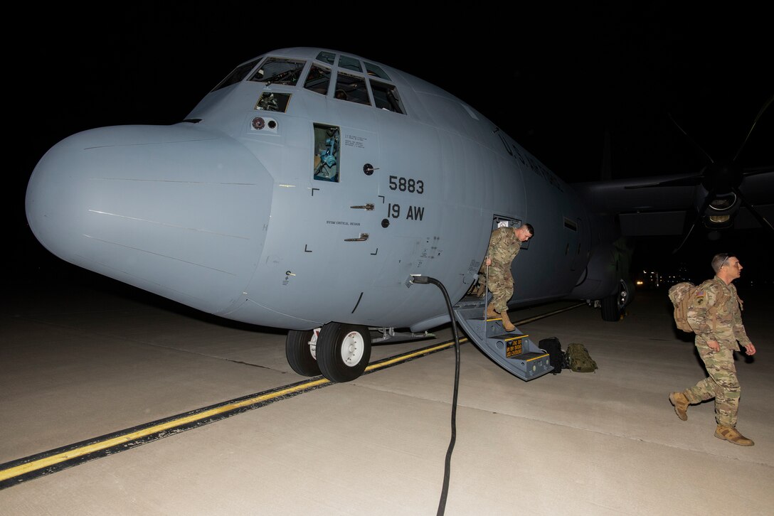U.S. Army Soldiers of the 9th Hospital Center, Fort Hood, Texas, and the 531st Hospital Center, Fort Campbell, Ky., disembark a C-130J Super Hercules at Joint Base McGuire-Dix-Lakehurst, N.J., March 25, 2020, in support of the Department of Defense’s COVID-19 response. The 621st Mobility Support Operations Squadron AMLOs provided airlift support to U.S. Army North to move soldiers into field hospital units in COVID-19 hotspots.   (U.S. Air Force photo by Senior Airman Ariel Owings)
