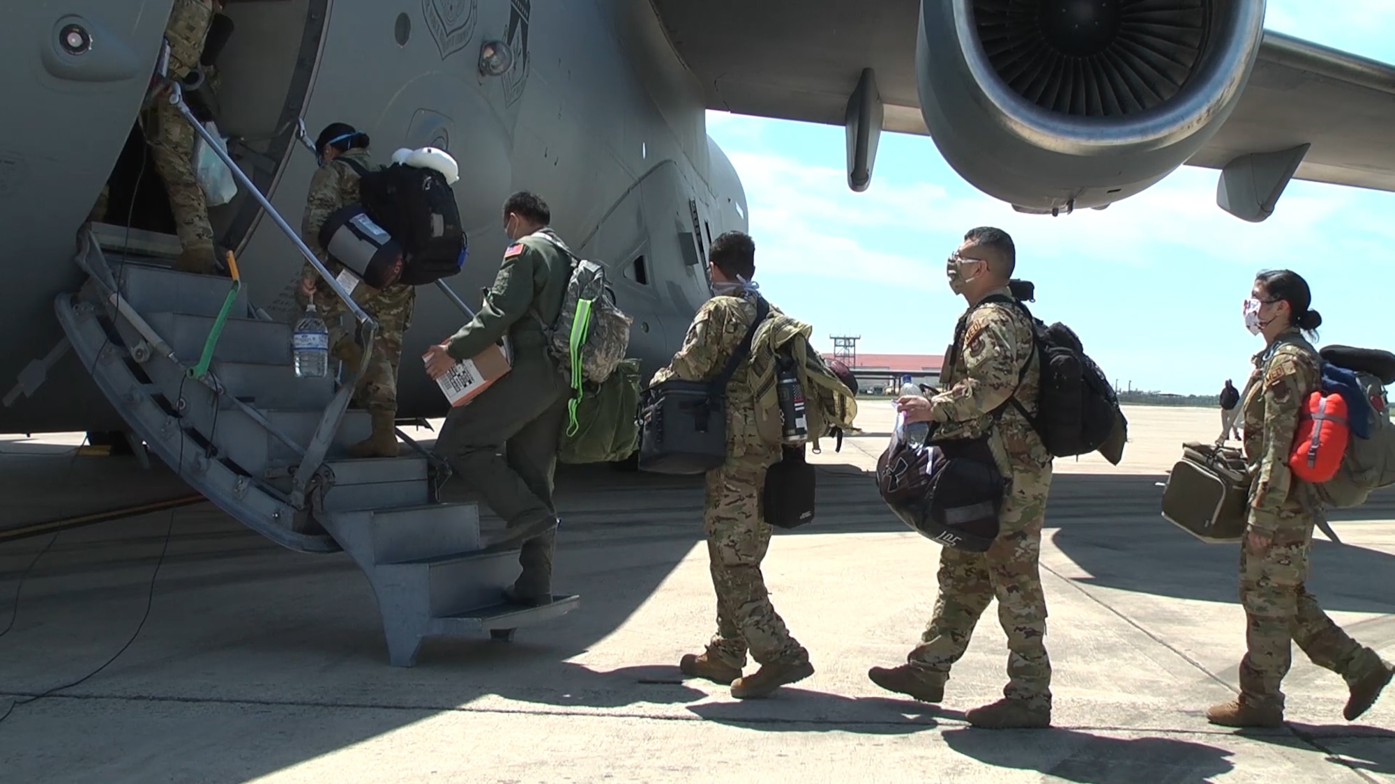 Medical personnel with the 433rd Aeromedical Evacuation Squadron board a C-17 Globemaster III April 15, 2020 at Joint Base San Antonio-Lackland, Texas.