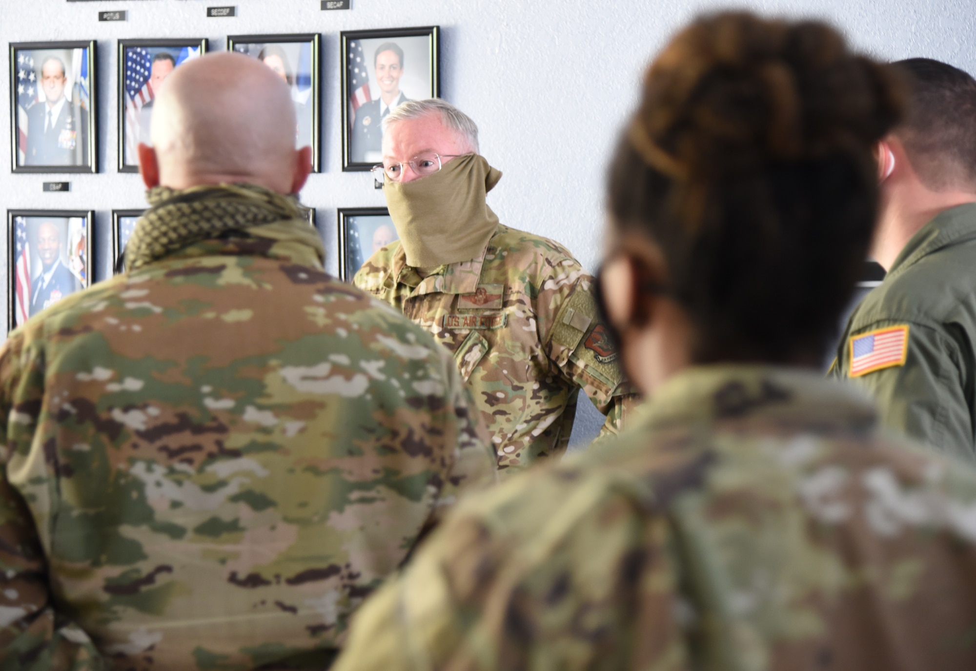 Col. Jeffrey A. Van Dootingh, 403rd Wing commander, addresses approximately 10 Airmen with the 403rd Wing's 36th Aeromedical Evacuation Squadron prior to their departure April 15, 2020. The Reserve Citizen Airmen were mobilized to support COVID-19 relief efforts. These reservists will provide life-saving in-flight patient care. (U.S. Air Force photo by Lt. Col. Marnee A.C. Losurdo)