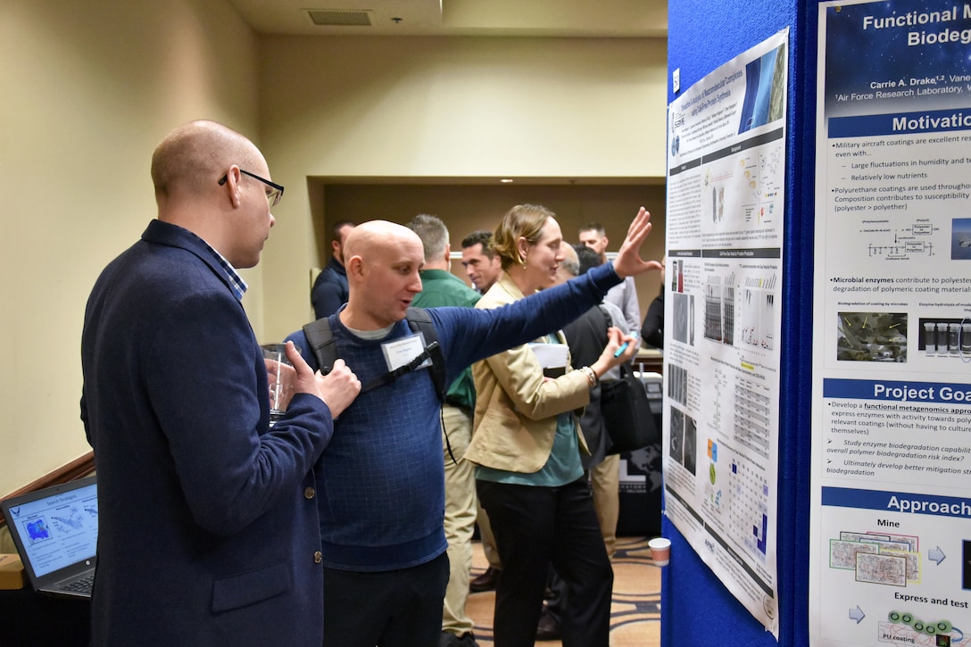 Dr. Drew Wagner (UES/Materials and Manufacturing Directorate) and Dr.Matthew Dickerson (Materials and Manufacturing Directorate) discuss the recombinant production of sub-micron gas vesicles and their potential in military applications. (U.S. Air  Force photo/Spencer Deer)