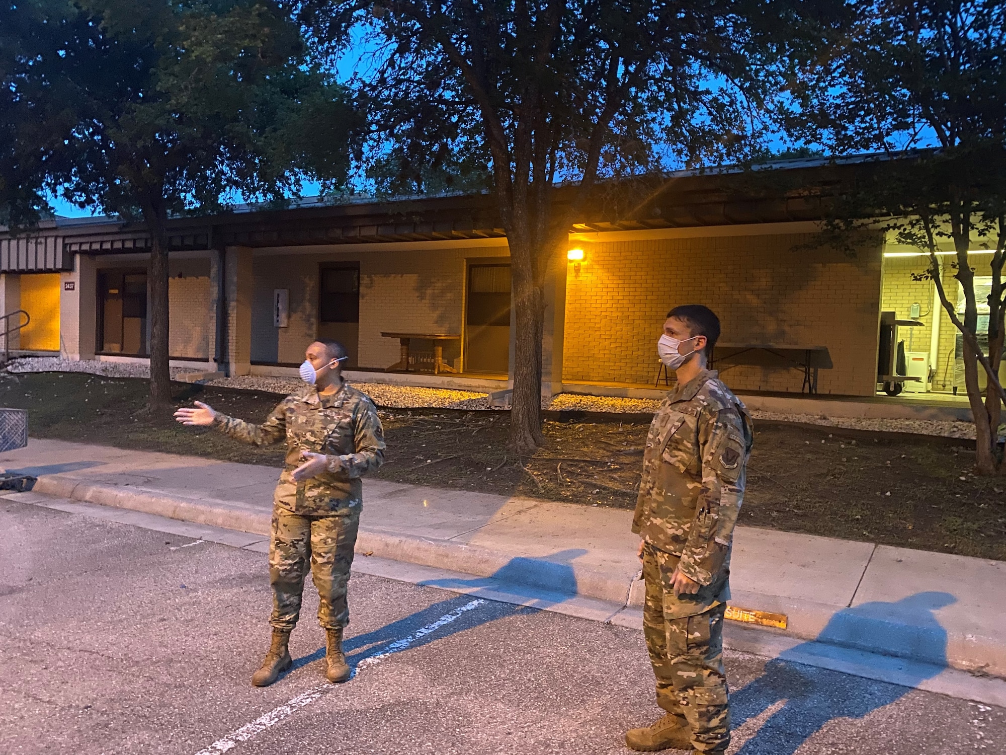 U.S. Air Force, Master Sgt. Stephanie Russ, 323rd Training Squadron, briefs volunteers for charge of quarters duty in support of Basic Military Training Airmen overnight Tuesday, April 7, 2020, Joint Base San Antonio – Lackland, Texas. CQ duties include intake, tracking and reporting, wellness checks, meal and personal item delivery, and arranging transport upon release.  (U.S. Air Force photo by Chief Master Sgt. Israel Jaeger)