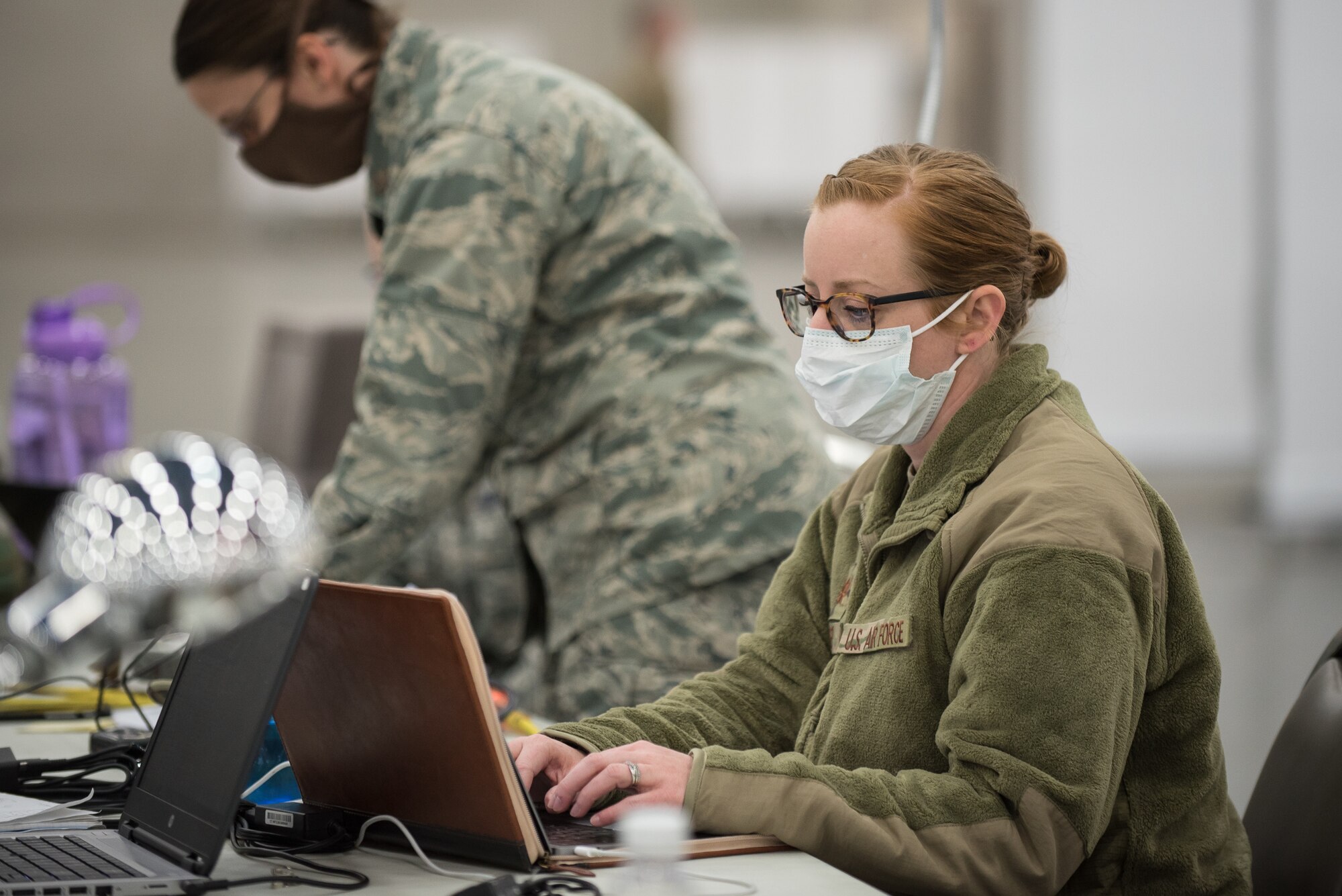 Maj. Amy Riley of the Kentucky Air National Guard’s 123rd Medical Group Detachment 1 prepares staff schedules for an Alternate Care Facility at the Kentucky Fair and Exposition Center in Louisville, Ky., April 14, 2020. The site, which is expected to be operational April 15, will serve patients suffering from COVID-19 if area hospitals exceed available capacity. The facility initially will offer care for up to 288 patients and is scalable to 2,000 beds. (U.S. Air National Guard photo by Dale Greer)