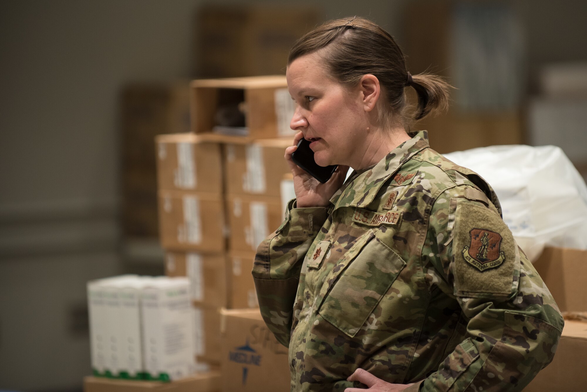 Maj. Tiffany Hubbard of the Kentucky Air National Guard’s 123rd Medial Group coordinates clinical support at the Kentucky Fair and Exposition Center in Louisville, Ky., April 11, 2020. The site, which is expected to be operational April 15, will serve as an Alternate Care Facility for patients suffering from COVID-19 if area hospitals exceed available capacity. The location initially can treat up to 288 patients and is scalable to 2,000 beds. (U.S. Air National Guard photo by Dale Greer)