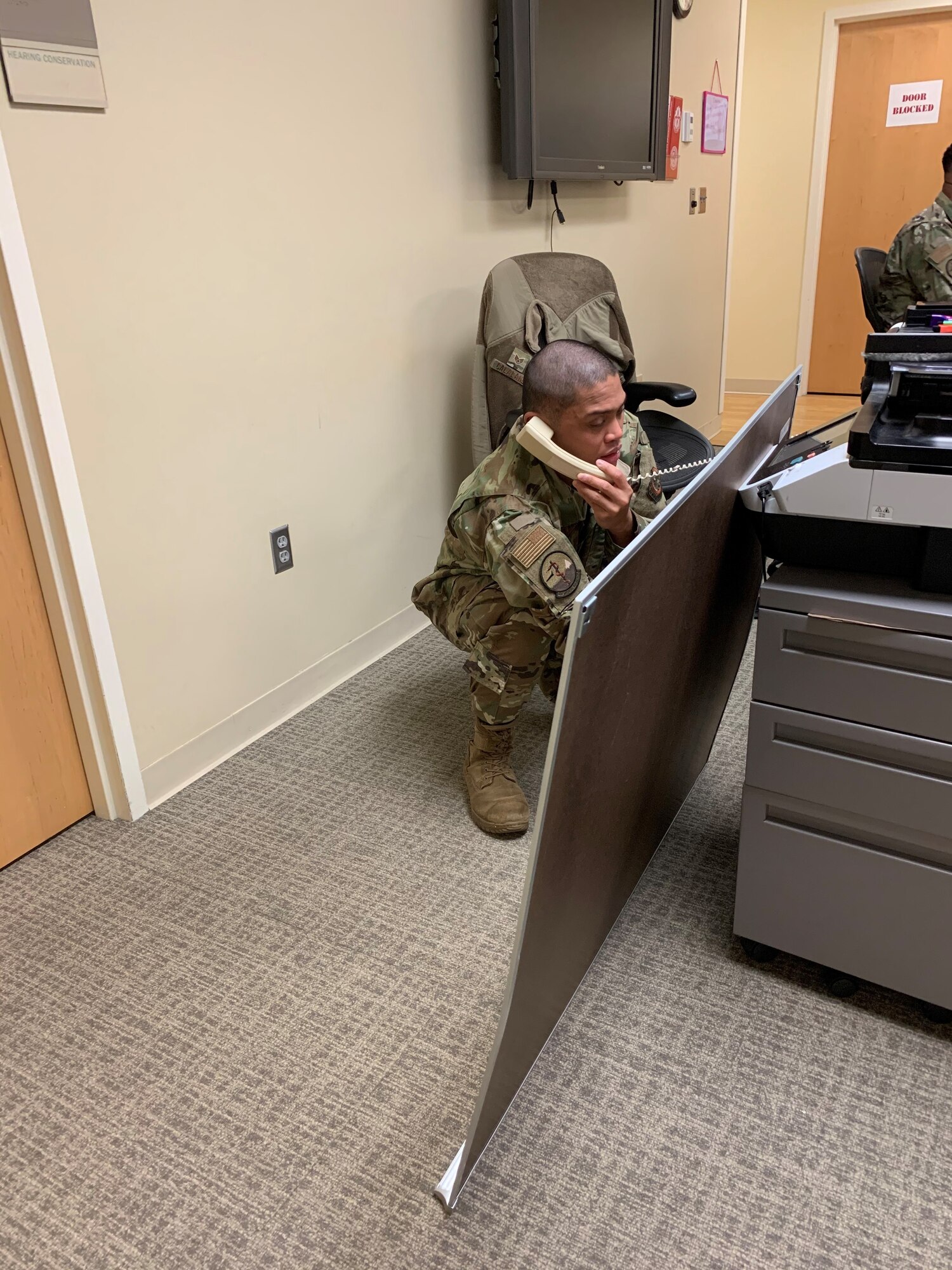 Staff Sgt. Jerry-Lee Calalang, 62nd Medical Squadron public health technician, conducts contact tracing with a COVID-19 patient over the phone on Joint Base Lewis-McChord, Wash., April 7, 2020. The purpose of contact tracing is to find cases as quickly as possible, limit their exposures to others and stop further spread of COVID-19. (Courtesy photo)