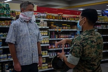 U.S. Marine Corps Col. Raul Lianez, commanding officer, Marine Corps Base Hawaii, speaks to Sen. Gil Riviere, (D-HI), during a tour of MCBH, Apr. 15, 2020. Sen. Jarrett Keohokalole, (D-HI), and Riviere visited the base to discuss the COVID-19 response and toured the installation to observe how prepared and resilient the installation and MCBH community members are. MCBH is currently in Health Protection Condition Charlie, which is where the military and medical leaders are taking necessary precautions to prevent or respond to a potential outbreak. (U.S. Marine Corps photo by Cpl. Matthew Kirk)