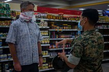 U.S. Marine Corps Col. Raul Lianez, commanding officer, Marine Corps Base Hawaii, speaks to Sen. Gil Riviere, (D-HI), during a tour of MCBH, Apr. 15, 2020. Sen. Jarrett Keohokalole, (D-HI), and Riviere visited the base to discuss the COVID-19 response and toured the installation to observe how prepared and resilient the installation and MCBH community members are. MCBH is currently in Health Protection Condition Charlie, which is where the military and medical leaders are taking necessary precautions to prevent or respond to a potential outbreak. (U.S. Marine Corps photo by Cpl. Matthew Kirk)