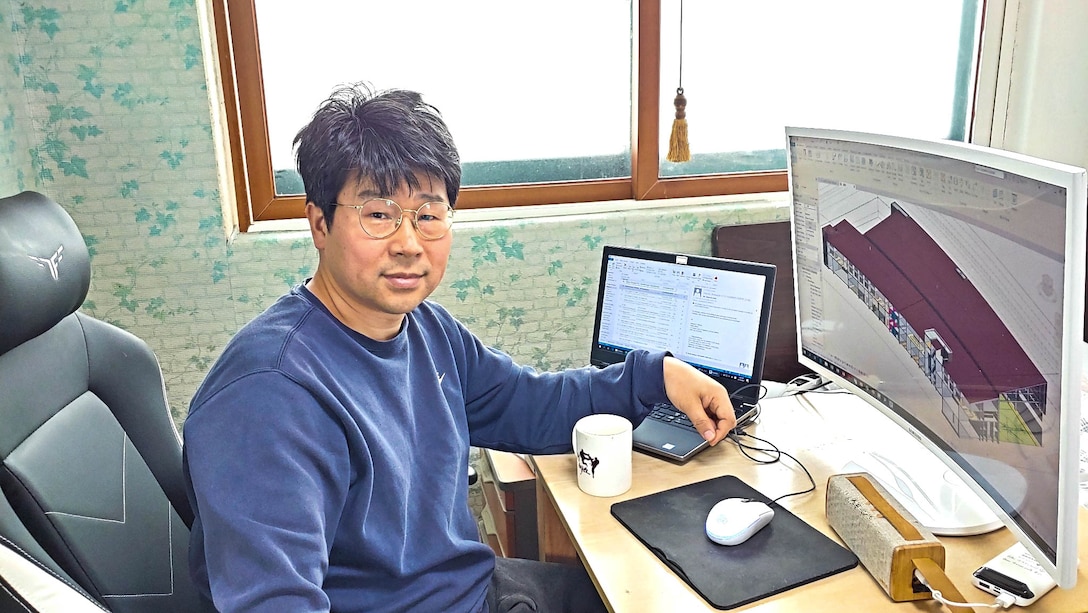 Hur, Myo Boon, U.S. Army Corps of Engineers, Far East District
architectural section chief, conducts work at her home during the district
telework schedule in response to preventing the spread of COVID 19, Apr. 15.