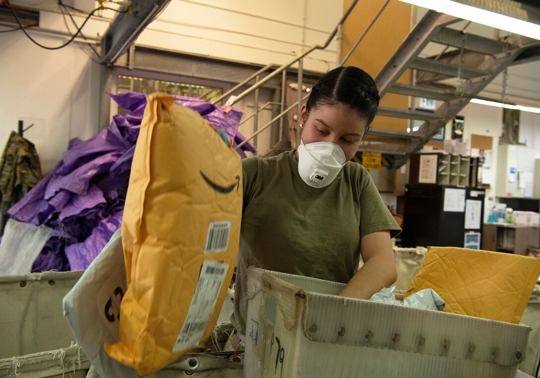 When packages arrive via a mail truck, post office employees must sort through, stock, and prepare the mail for pickup.