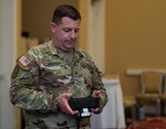 Staff Sgt. Johnnie Walker with the 256 Medical Company trains Florida Army National Guard Soldiers on basic lifesaving skills during a Combat Life Saver Course at the Orange County Convention Center community based testing site in April 2020.