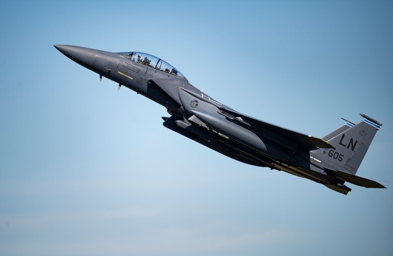 An F-15E Strike Eagle assigned to the 492nd Fighter Squadron performs a flight maneuver above Royal Air Force Lakenheath, England, April 15, 2020. Despite the current COVID-19 crisis, the 48th Fighter Wing has a critical mission of delivering combat air power when called upon that must continue. (U.S. Air Force photo by Airman 1st Class Madeline Herzog)