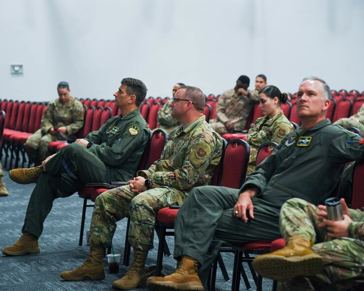 Spectators listen to a presentation at Barksdale's Spark Tank 2020 competition at Barksdale Air Force Base, La., April 8.2020.Spark Tank is an Air Force-wide initiative that solicits ideas from Airmen of all ranks on ways to improve the mission. (U.S. Air Force photo by Senior Airman Taylor Hunter)