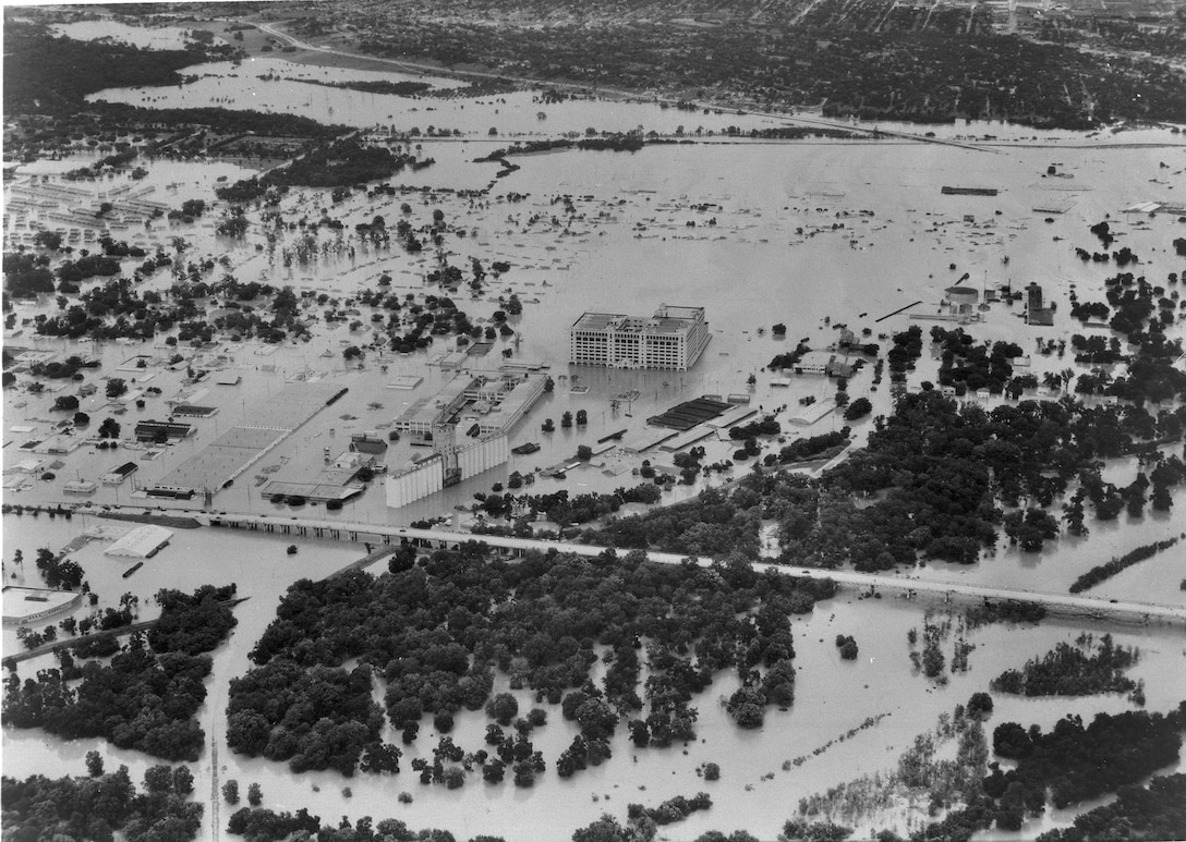 Aerial photo of 1949 flood along W. 7th St., Fort Worth, Montgomery Ward store in center