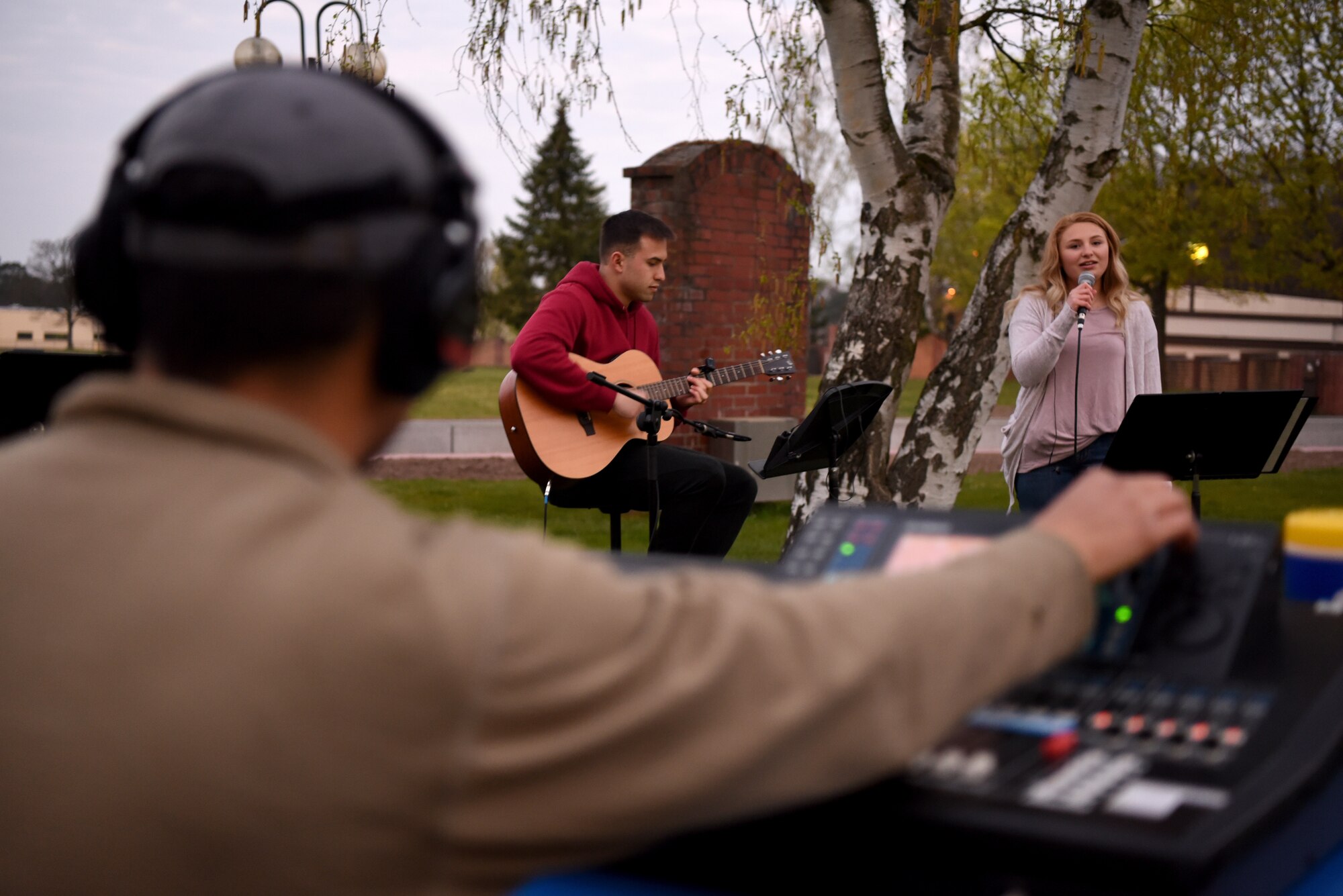 Members of the Contemporary Service Worship Team record their music outside the Northside Chapel at Ramstein Air Base, Germany, April 9, 2020.
