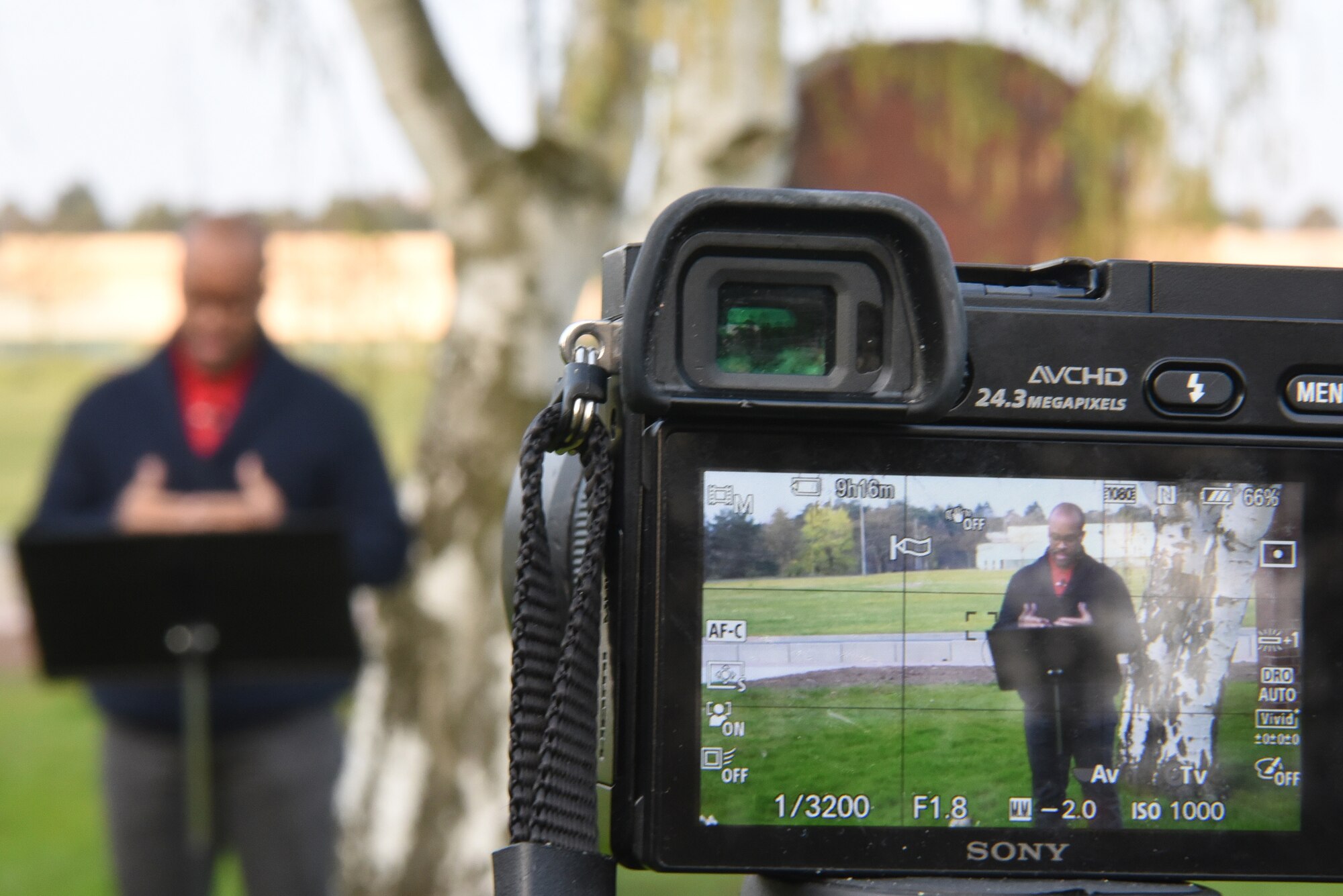 U.S. Air Force Capt. Alex Johnson, 86th Airlift Wing staff chaplain, records a sermon for future viewers outside the Northside Chapel at Ramstein Air Base, Germany, April 9, 2020